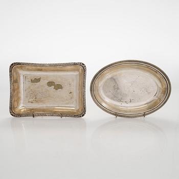 A set of four silver plated entree dishes, England.