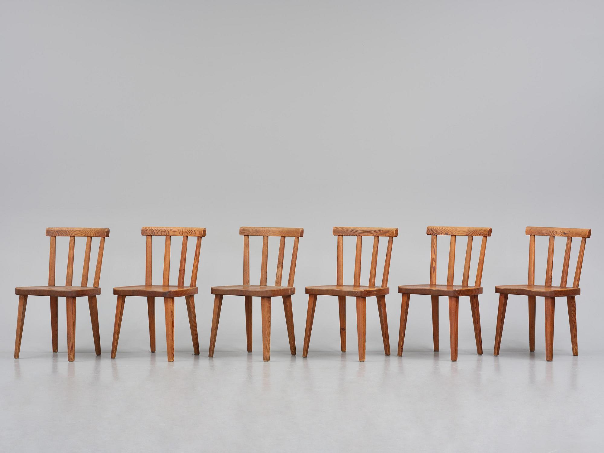 Axel Einar Hjorth, a set of six stained pine "Utö" chairs, Nordiska Kompaniet, Sweden, 1930s.