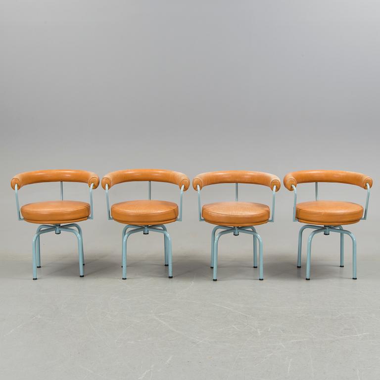 A set of four "LC7" chairs by Le Corbusier, Pierre Jeanneret and Charlotte Perriand for Cassina.