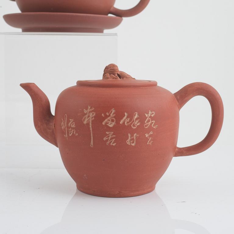 A collection of Yixing tea pots and tea cups, China, second half of the 20th century.