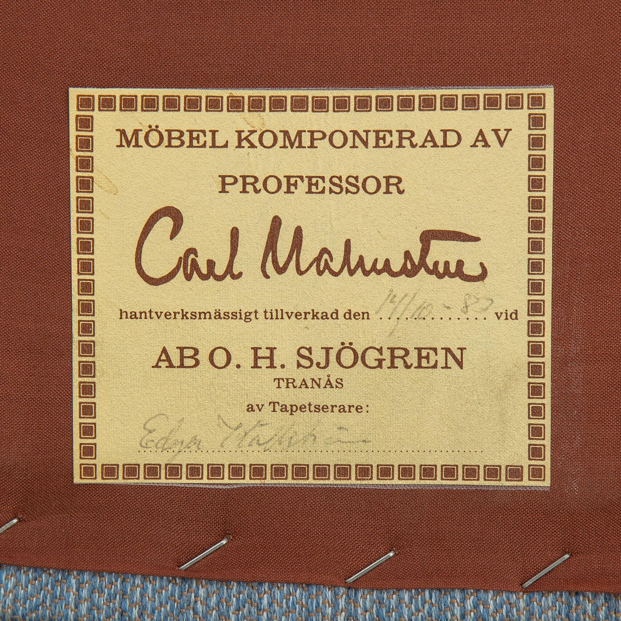 A second half of the 20th Century armchair by Carl Malmsten.