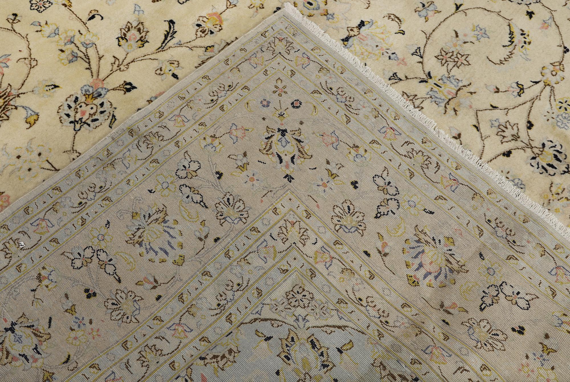 A Keshan carpet, 405 x 304 cm.