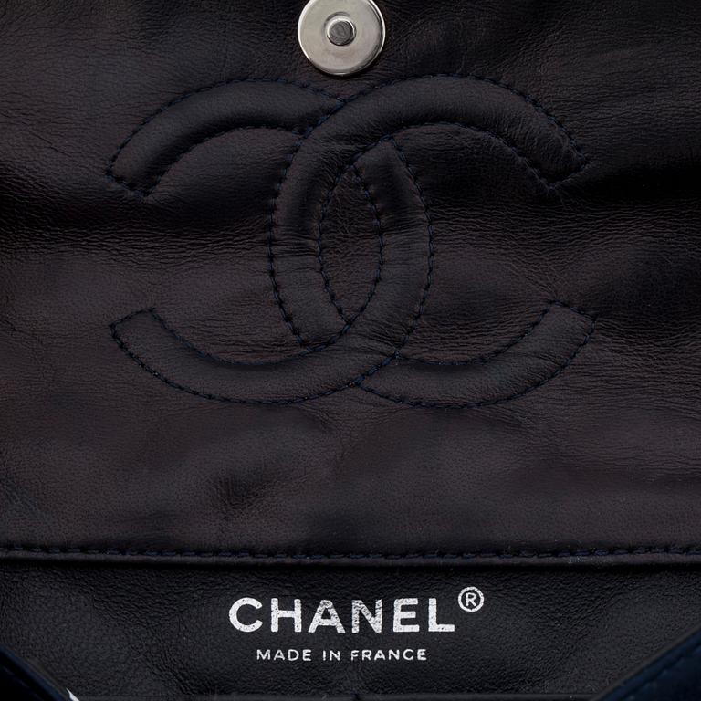 CHANEL, a quilted blue silk "Double Flap" shoulder bag with sequin embellishment.