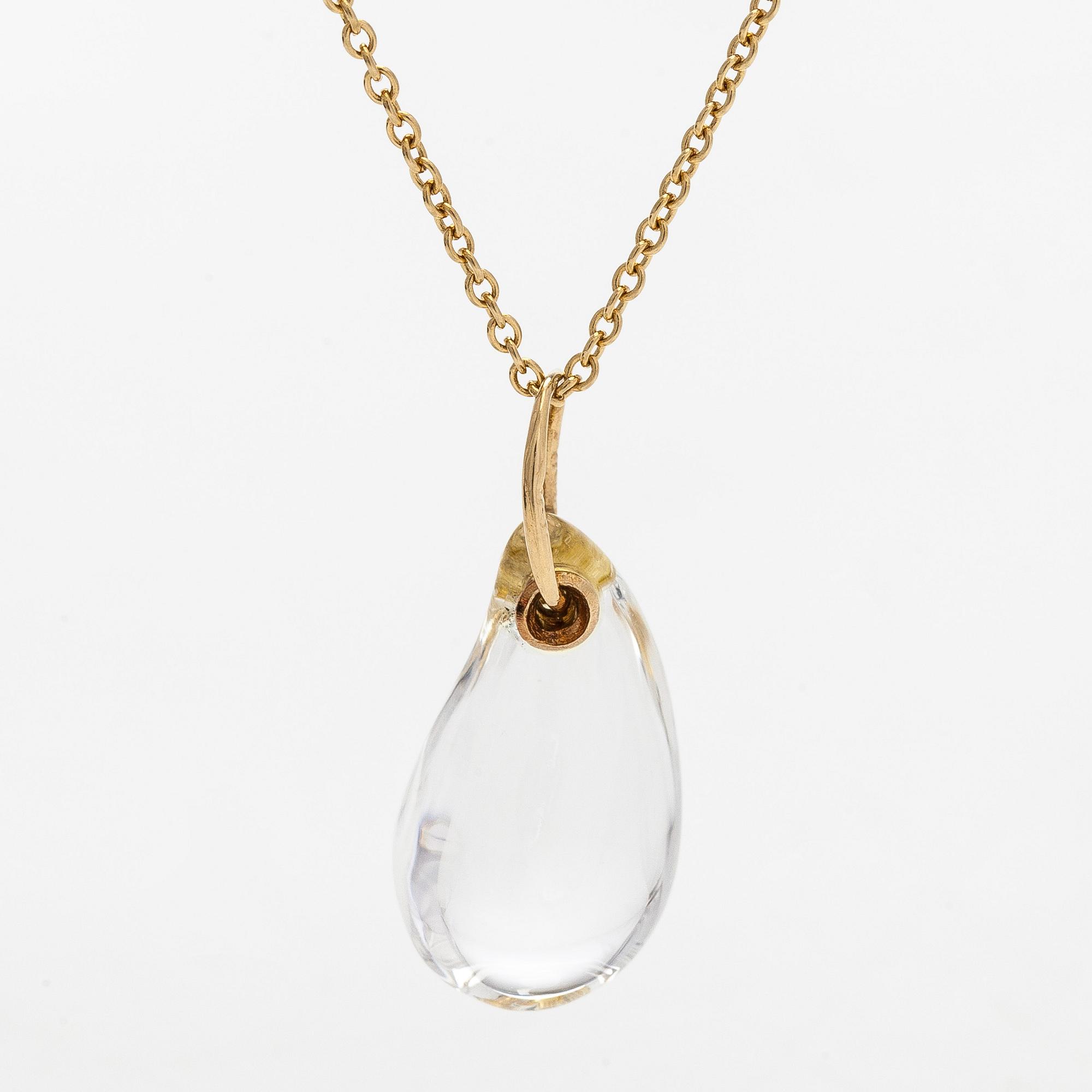 Tiffany & Co, Elsa Peretti, an 18K gold "Teardrop" necklace with a rock crystal pendant.