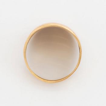 En ring och ett par örhängen 18K guld.