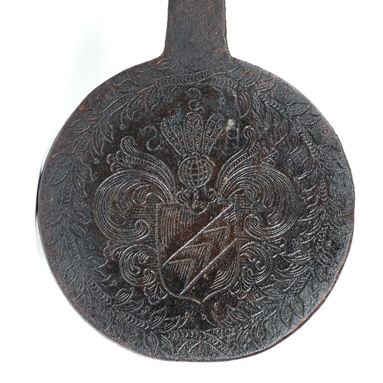 A waffle iron, 1653-1671, with the coat of arms of Per Silfversparre and Magdalena von Scheiding.