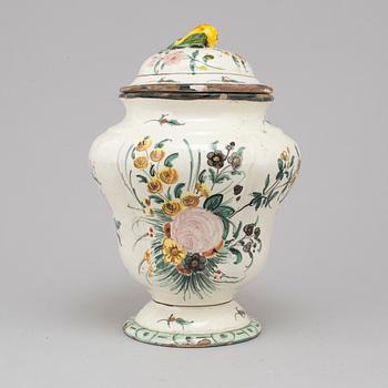 A 20th century urn and lid.