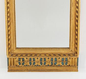 A late Gustavian mirror, circa 1800.