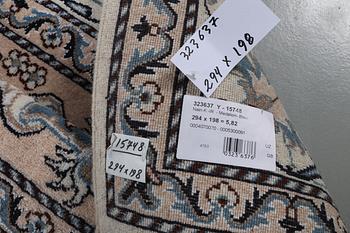 A carpet, Nain, part silk, ca 294 x 198 cm.