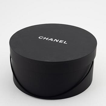 Chanel, a rabit hair hat with ribbon, size S.