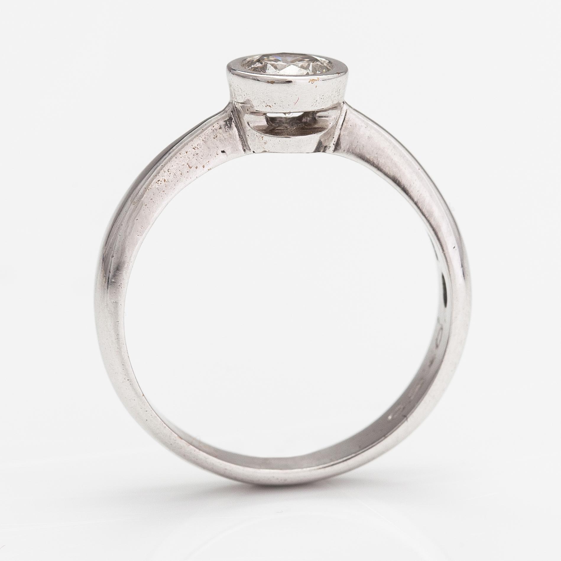 A 14K white gold ring with a ca. 0.50 ct diamond according to engraving.