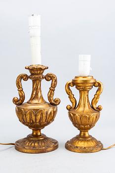 A set of four wood table lamps  from Paoletti, Firenze Italy, second half of 20th century.