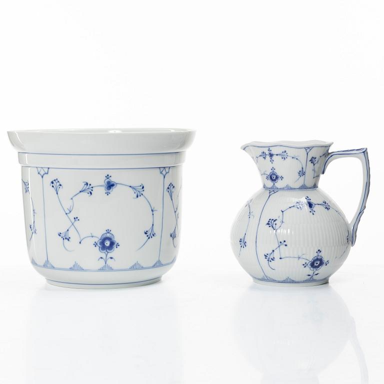 Royal Copenhagen, Three 'Musselmalet' jugs, circa 1900, and a Bing & Grøndahl cachepot, Denmark.