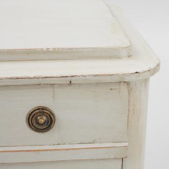 A chest of drawers, circa 1900.