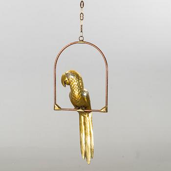 SERGIO BUSTAMENTE, sculpture in the form of a parrot.