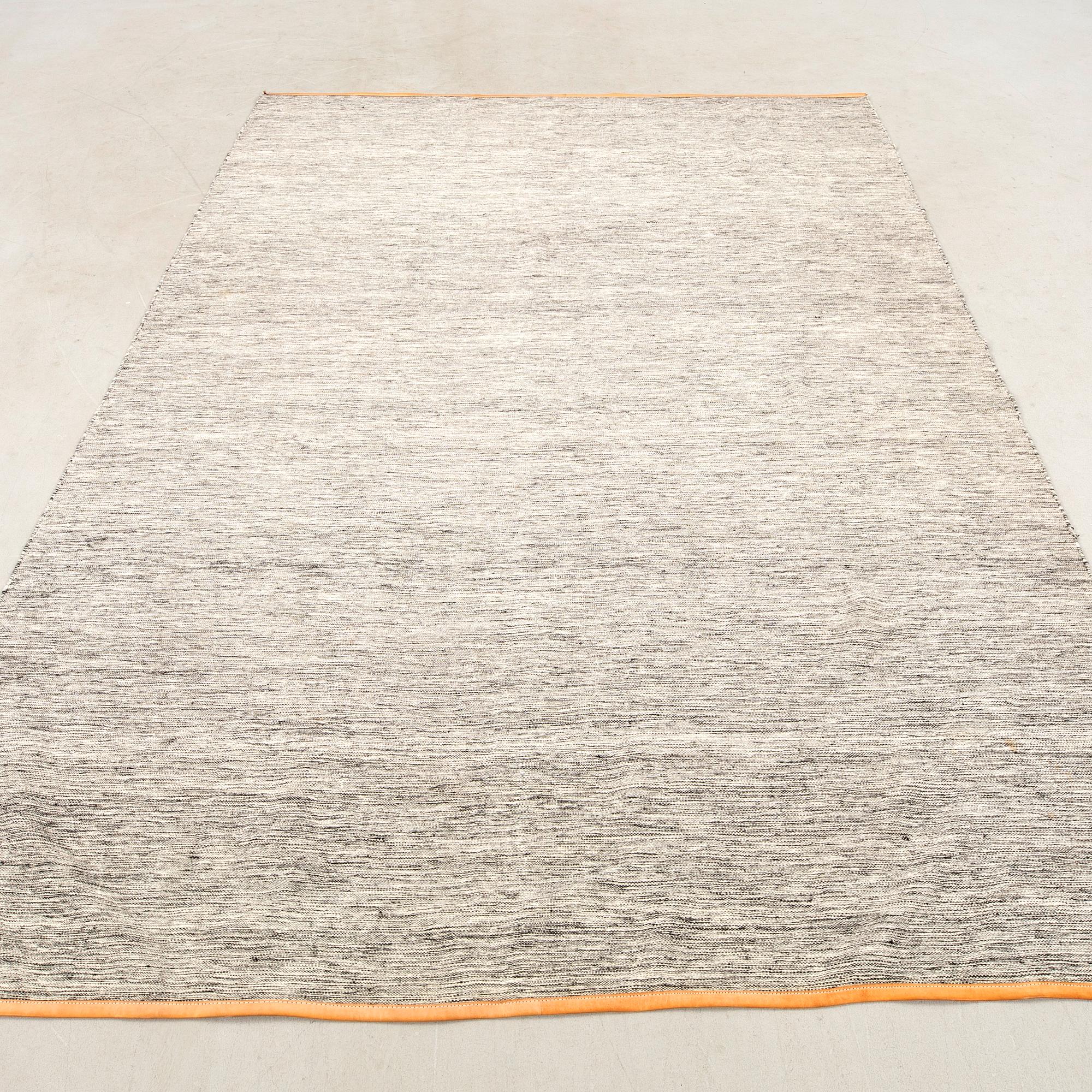 Lena Bergström rug for DesignHouse, leather-edged, approximately 288x195 cm.