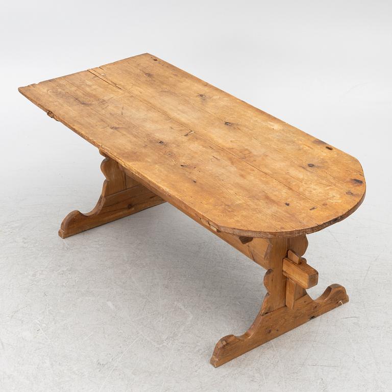 A 19th century pine table.