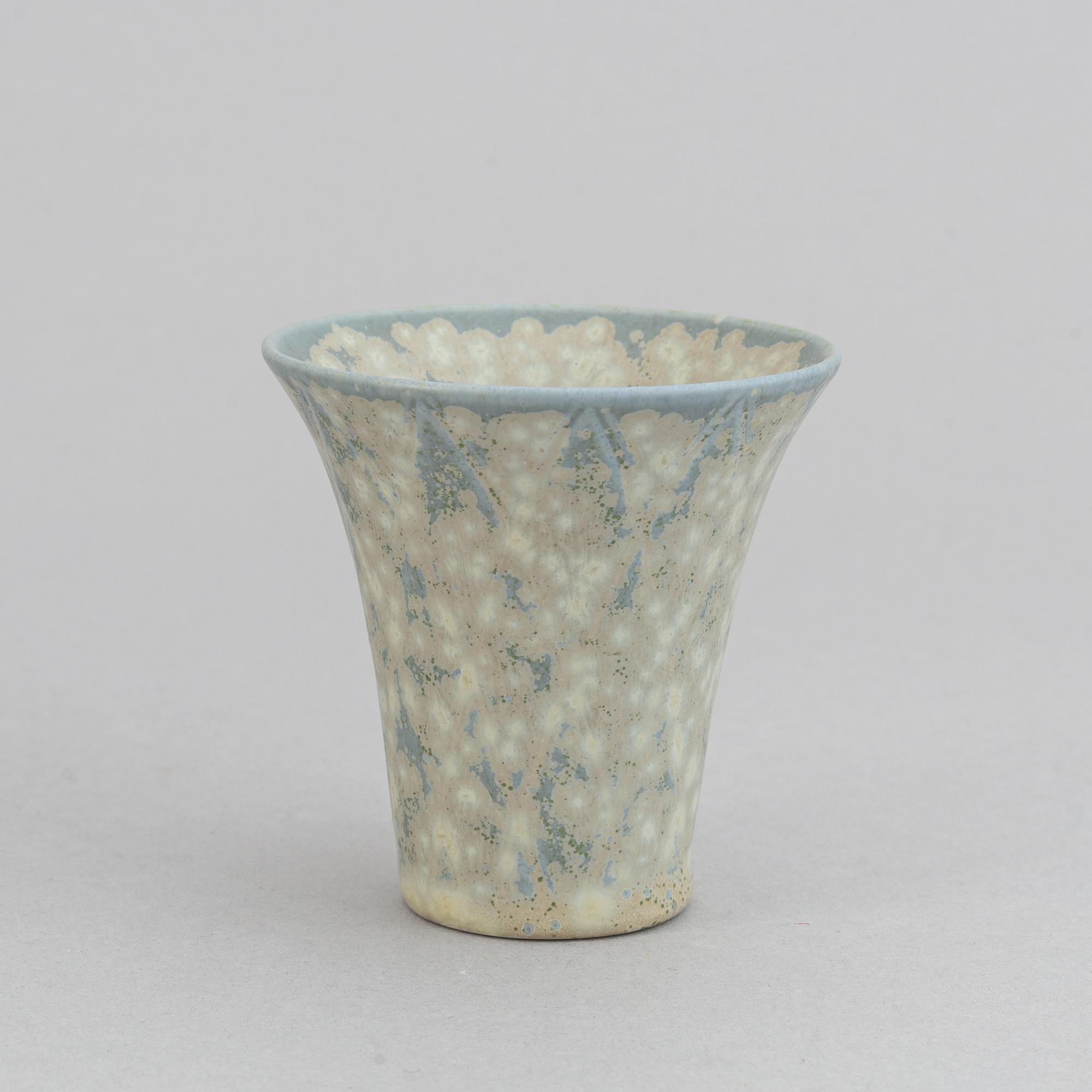 Gunnar Nylund, a set of two stoneware jugs and a vase, Rörstrand, 1950's/60's.