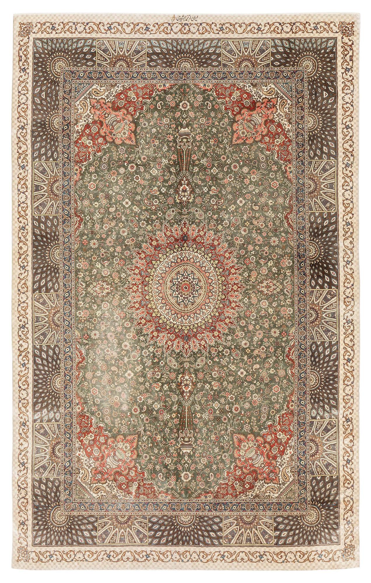 A silk Qum, Central Persia. signed Mohammad Gamshidi, c. 203 x 126 cm.