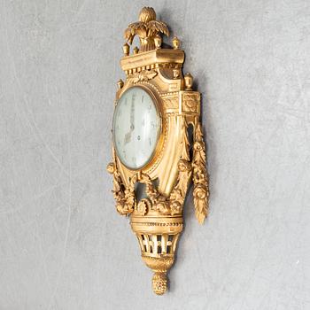 A Gustavian pendulum wall clock.