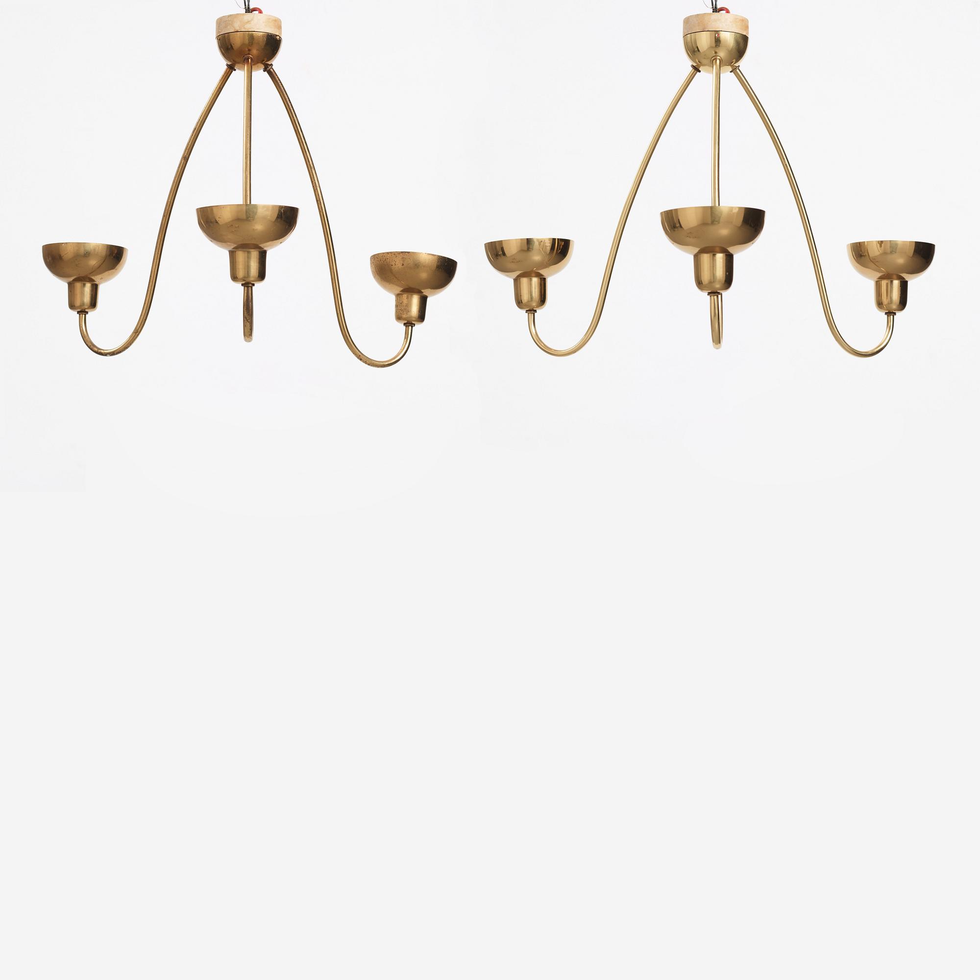 Josef Frank, a pair of three light brass ceiling lamps, model 'G2557', Svenskt Tenn, Sweden 1940-1950s.