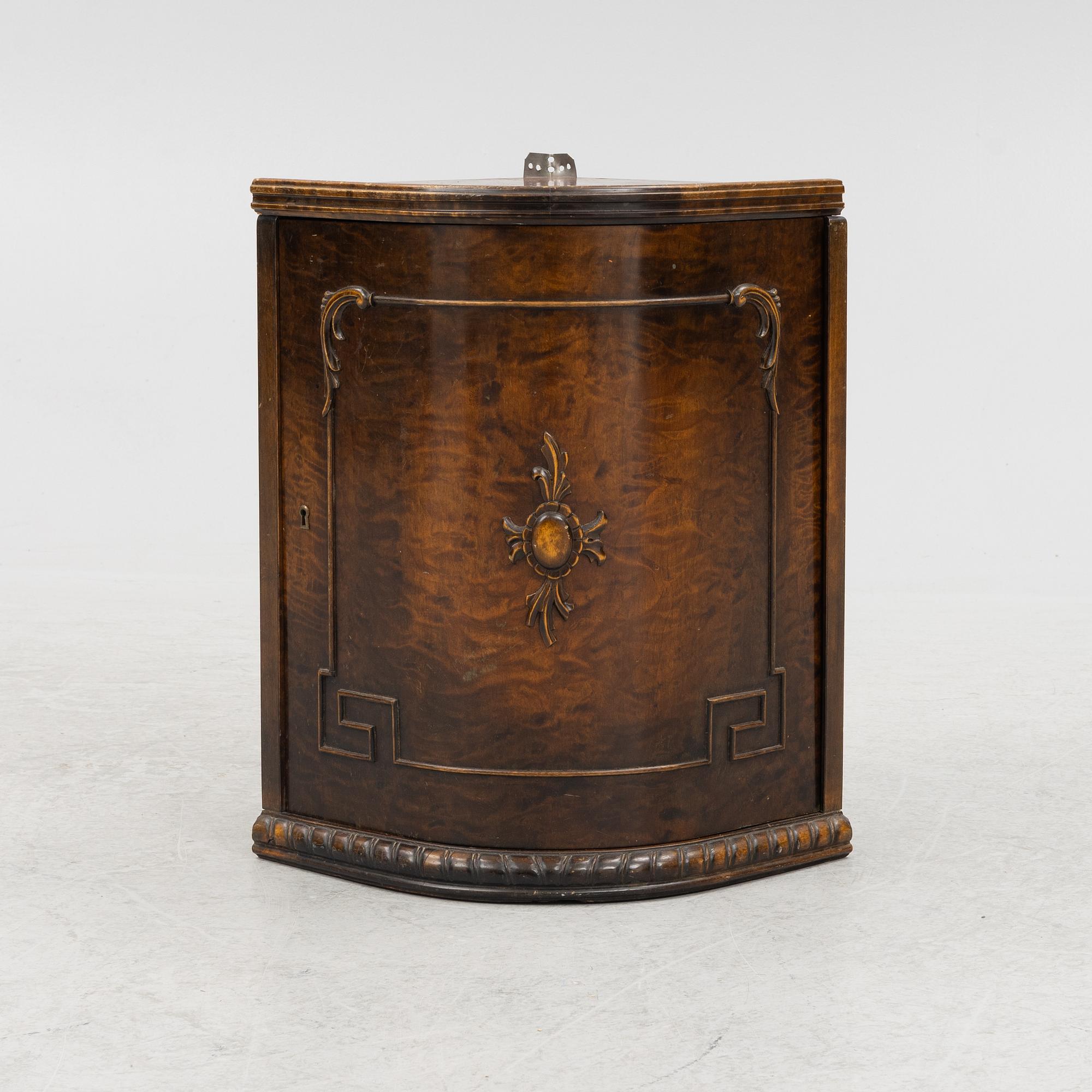 A 1930's bar cabinet.