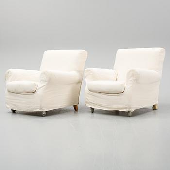 A pair of "Nonnamaria"easy chairs, Flexform.