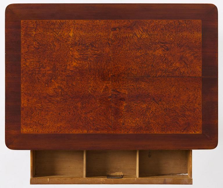 A Gustavian burr-parquetry and bilt brass-mounted table by A. Lundelius (master in Stockholm 1778-1823).