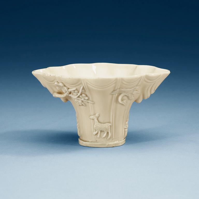 A blanc de chine libation cup, Qing dynasty, Kangxi (1662-1722).