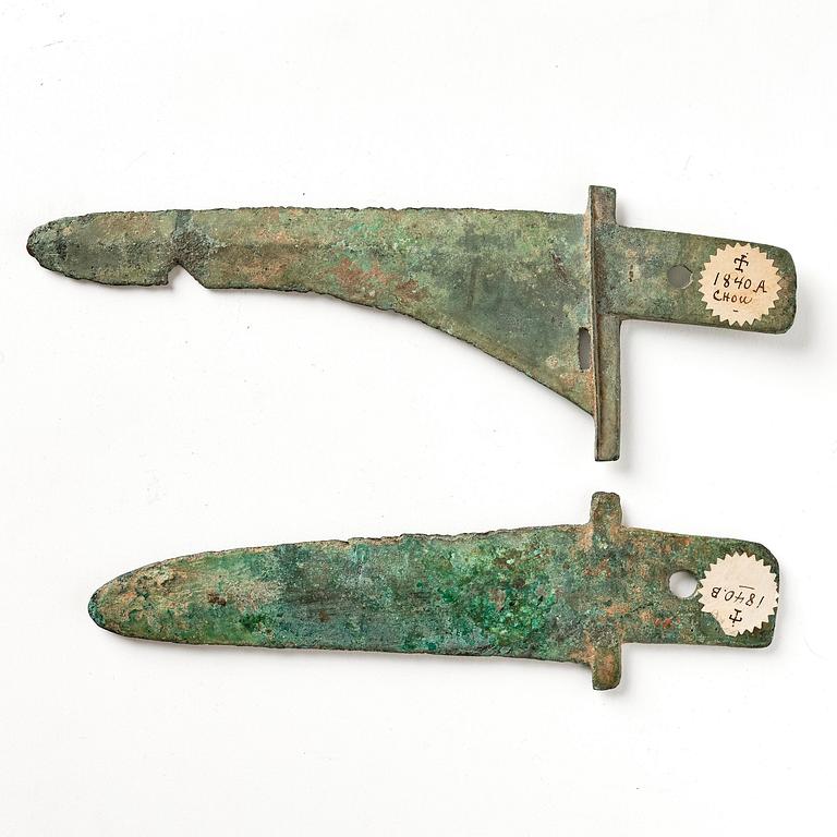 Two archaic bronze daggers,  Shou or Han dynasty.