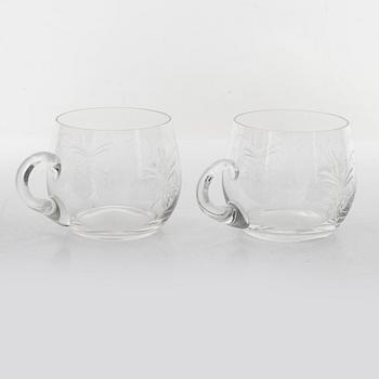 A punch bowl and mugs, glass, mid 20th century.