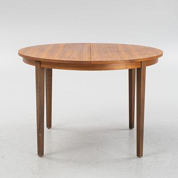 A walnut veneer dining table, 1950-60s.