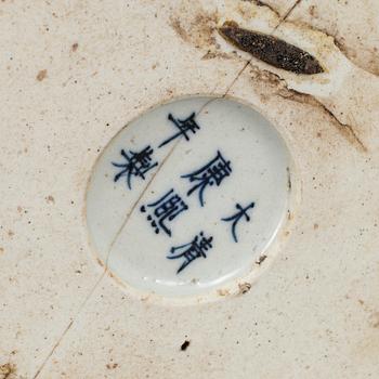 A Chinese blue and white Kangxi style brush pot.