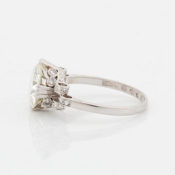 A platinum ring set with an old-cut diamond weight ca 3.00 cts quality ca J/K vs.