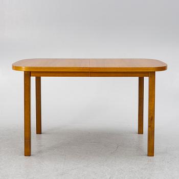 A dining table, 1950s/60s.