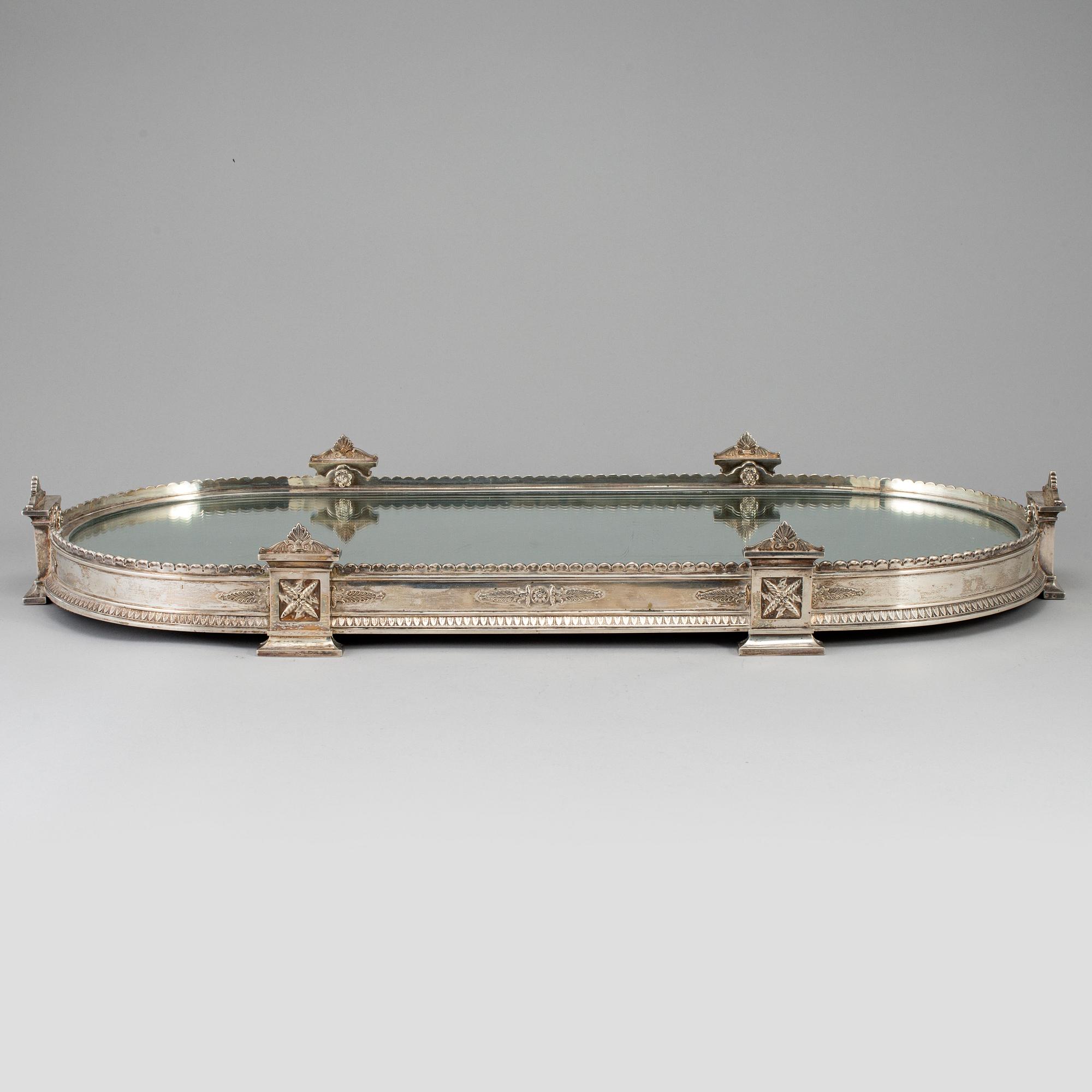 An Austrian-Hungarian early 20th century silver table-mirror. Empire-style.