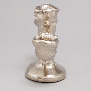 DAN WOLGERS, a silvergilt bronze candle stick, signed.