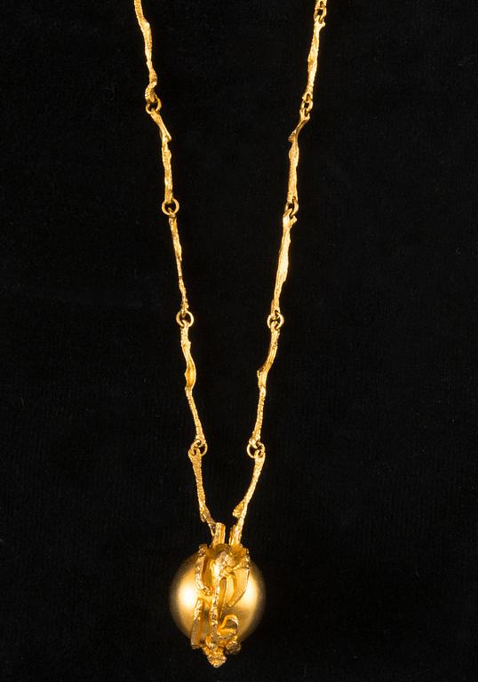 Björn Weckström, HALSSMYCKE MED KLOCKA, guld 18K,  "Sun Dial", Lapponia 1975. Vikt 67,9 g.
