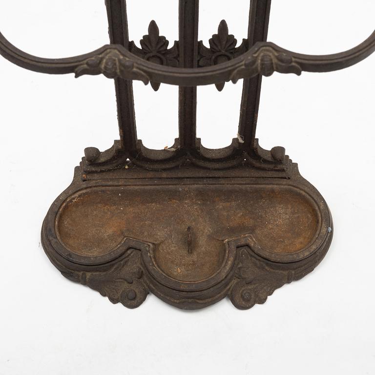 A cast iron umbrella stand, circa 1900.