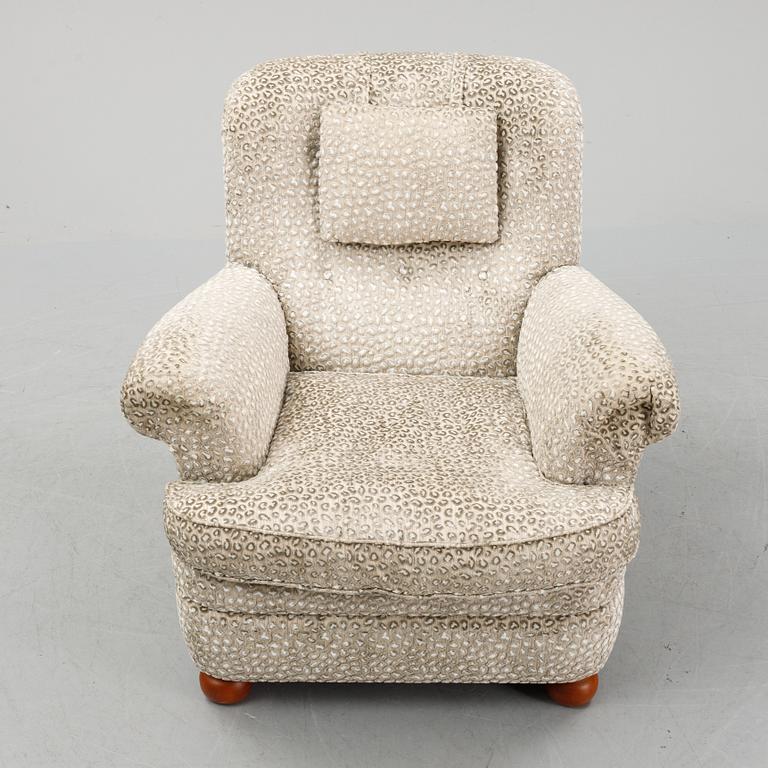 Josef Frank, a model 336 easy chair with ottoman, Svenskt Tenn.