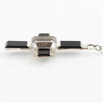 Wiwen Nilsson, a pendant in the form of a cross, sterling silver with onyx and step-cut rock crystal, Lund 1937.