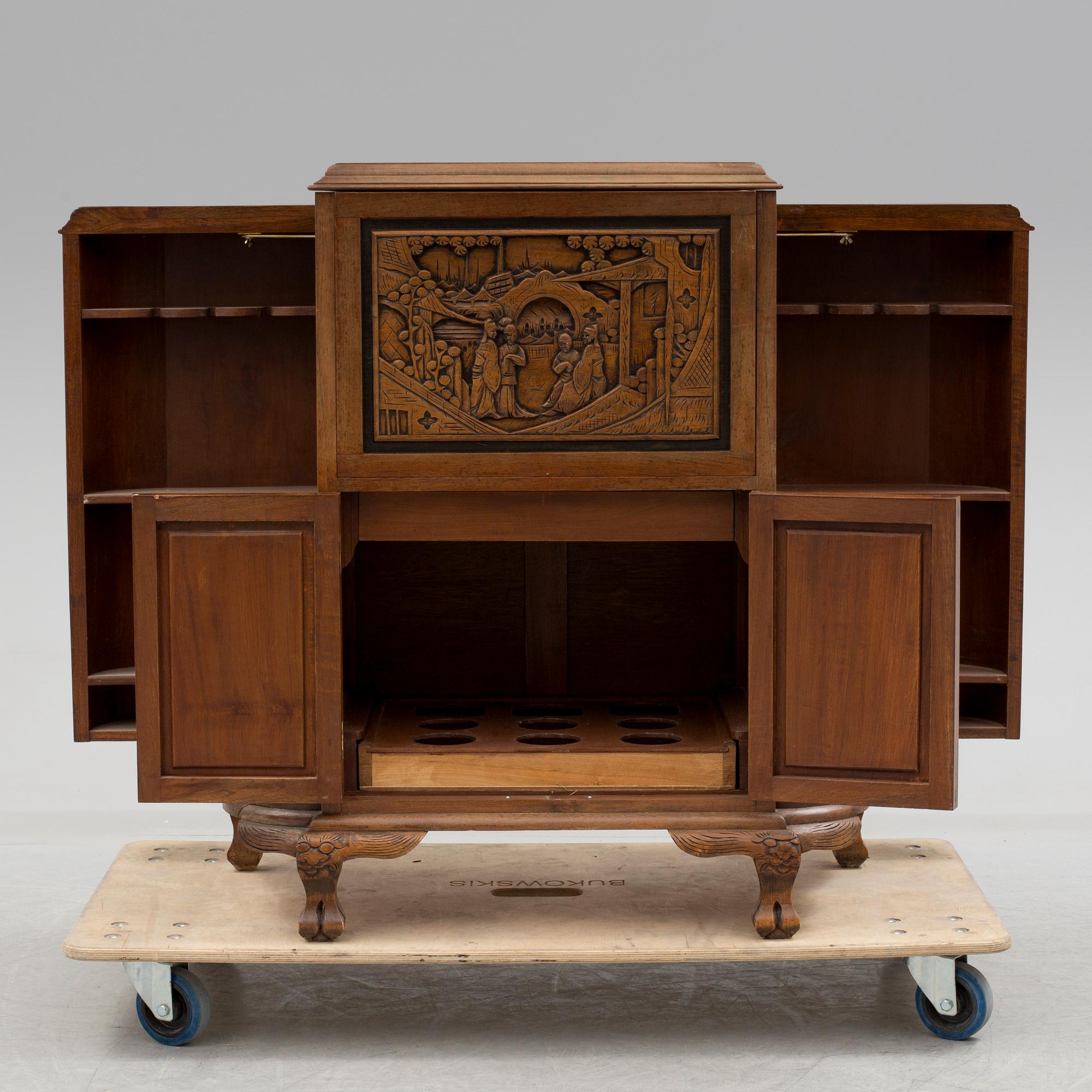 a chinese style bar cabinet from the late 20th century.