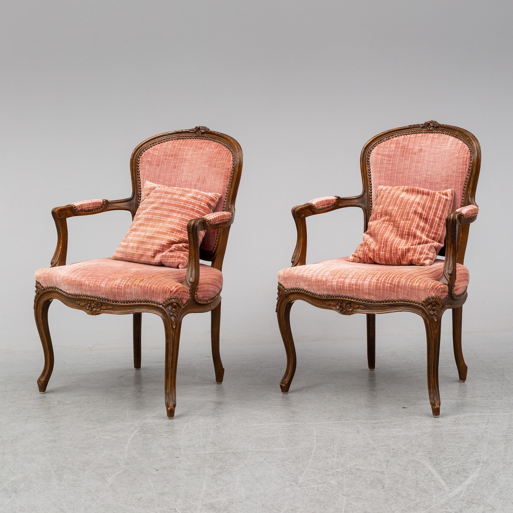 A pair of 19th-century rococo revival arm-chairs.