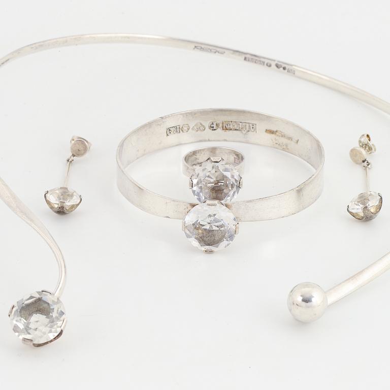 Pege Alton, silver and rock crystal, necklace, ring, bangle and earrings.