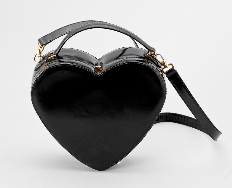 A black lacquer handbag by Moschino.