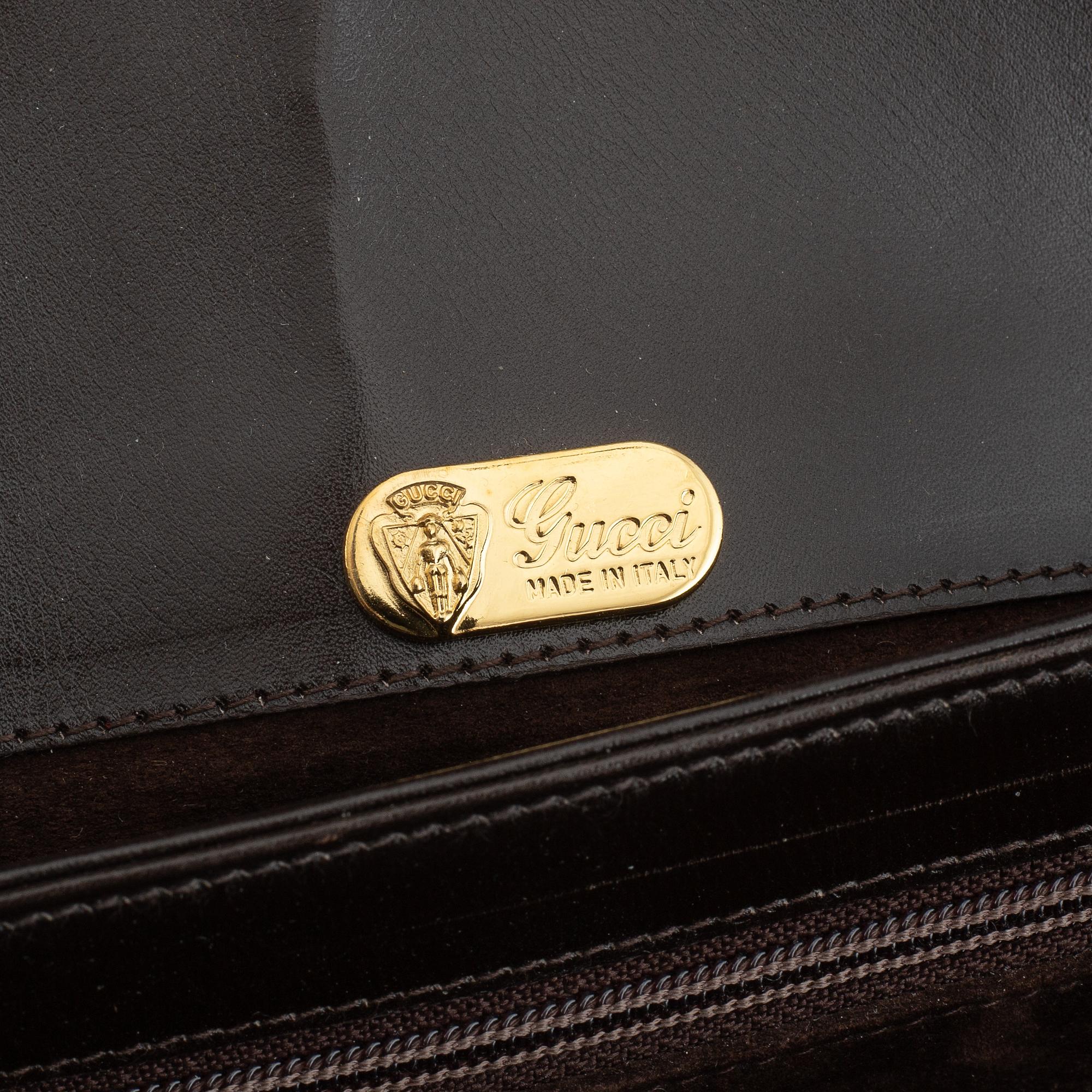 Gucci, a leather and bamboo bag.