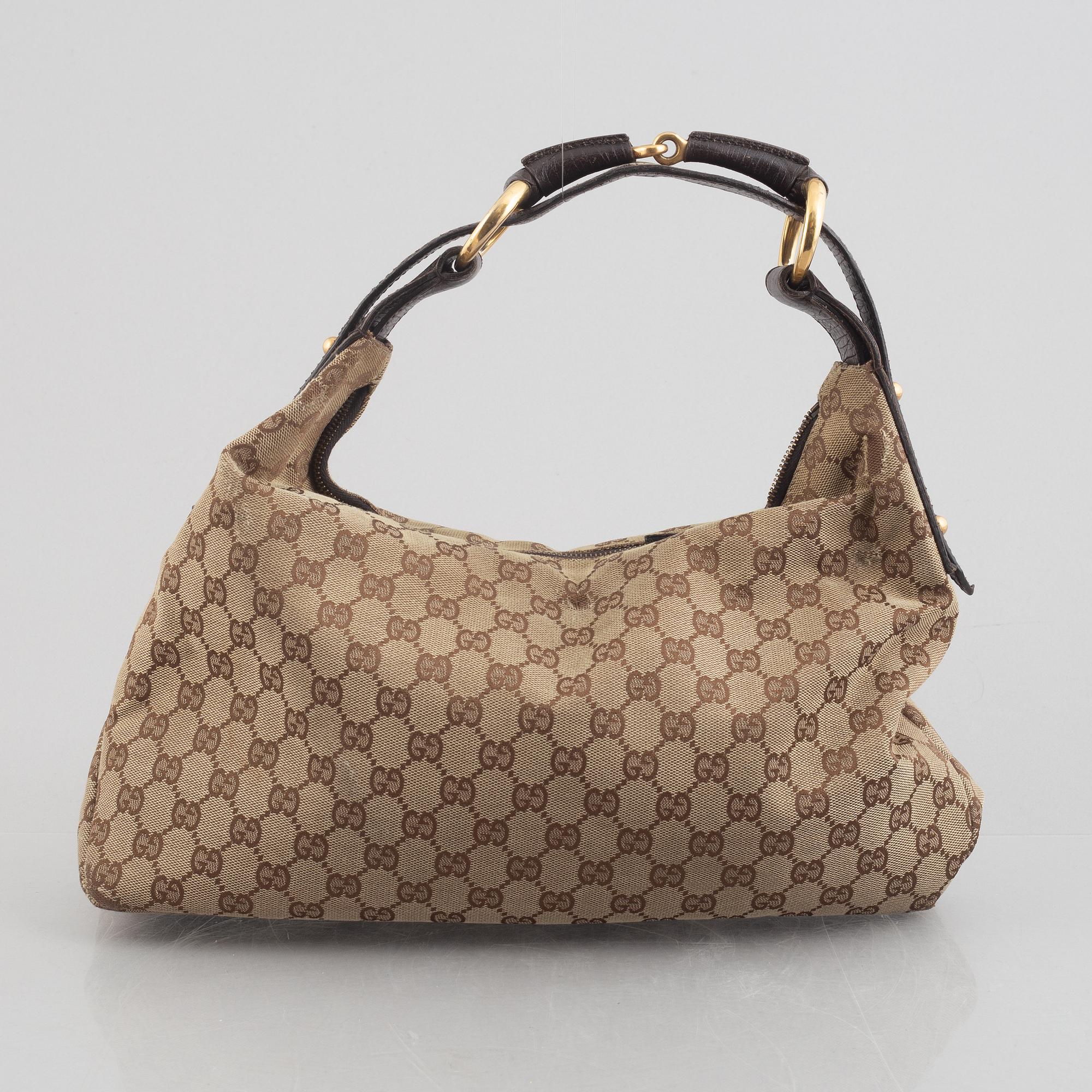 Gucci, a handbag.