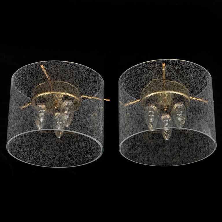 A pair of late 20th Century ceiling light by Kjell Munch.