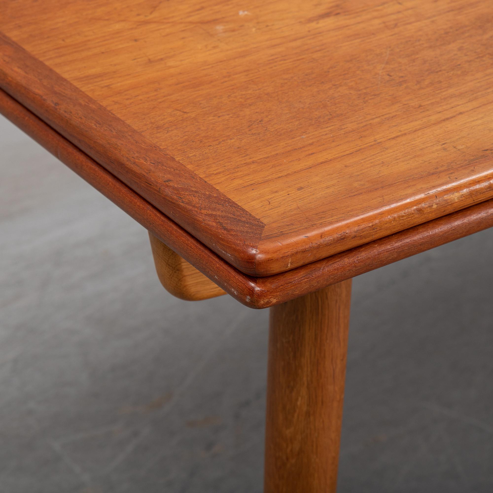 Hans J Wegner, a teak dining table, Andreas Tuck, Denmark.