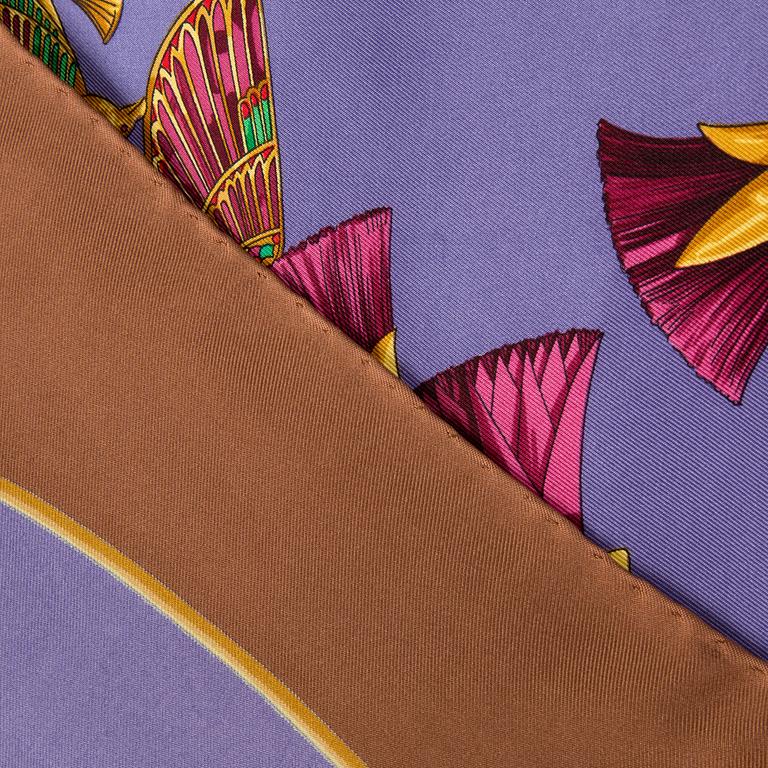 A silk scarf by Hermès.